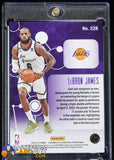 LeBron James 2022 - 23 Panini Chronicles Orange #228 Essentials #/75 basketball card, numbered